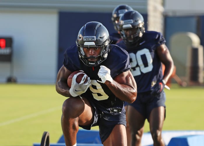 Virginia funning back Amaad Foston practicing.